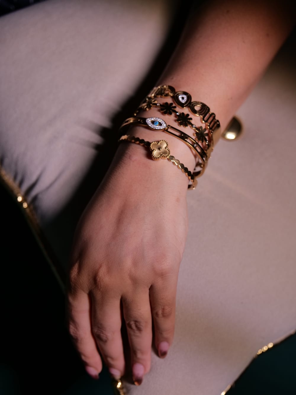 Gold statement bracelets